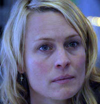 Robin Wright Penn al béisbol con Brad Pitt